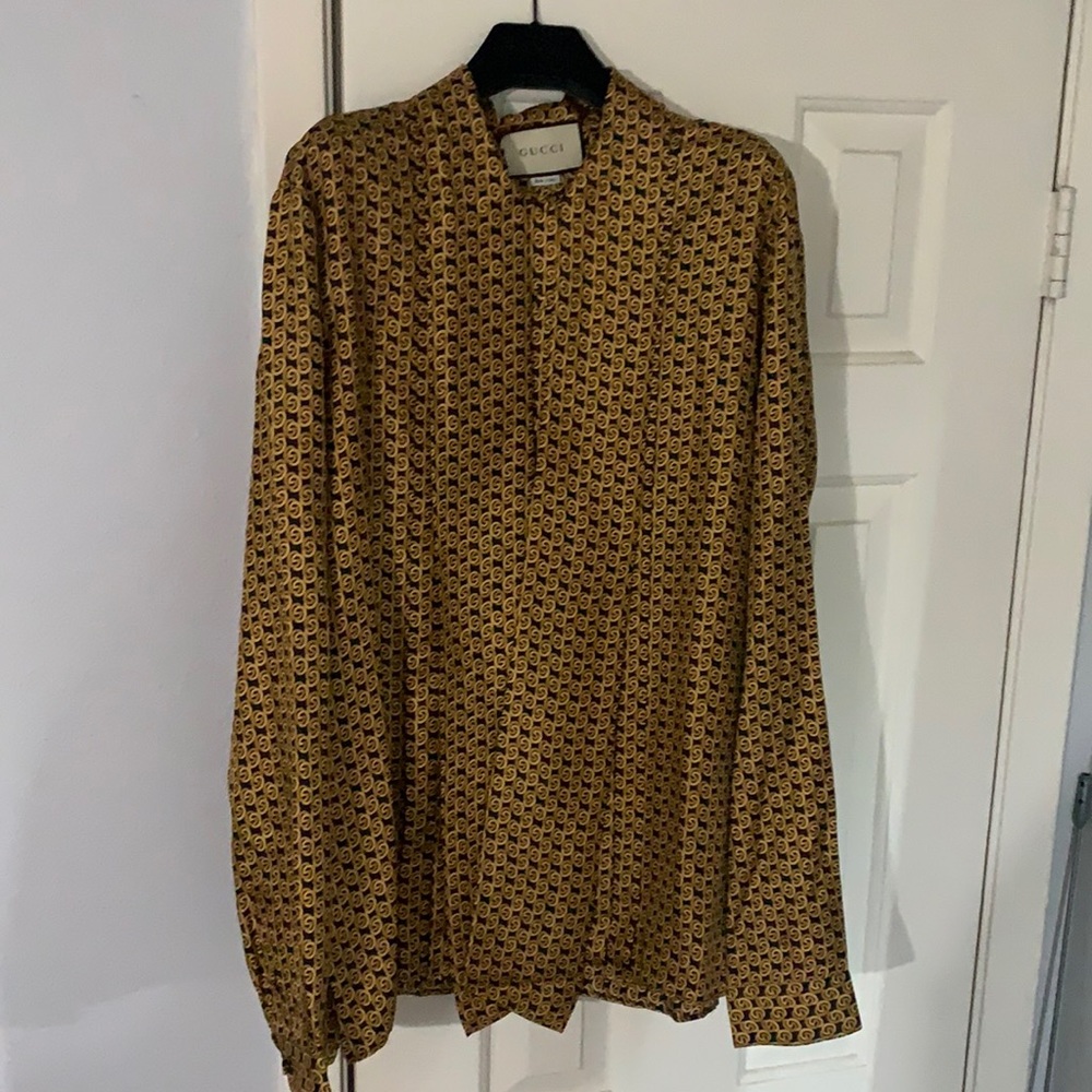 NWT Gucci black & gold GG pussy bow blouse.